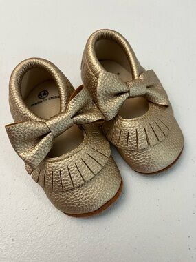 Gold Baby Girls Bow Fringe Moccasin Shoes